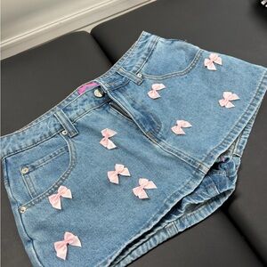 Edikted Light Blue Denim Skort with Pink Bow Embellishments